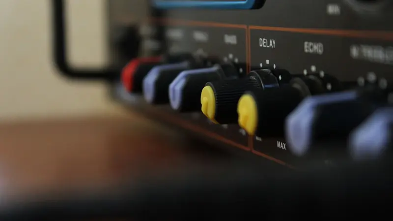 Detailed view of colorful control knobs on audio equipment showcasing modern technology